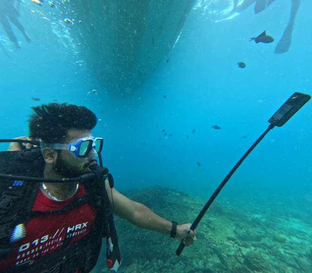 Scuba diver exploring reef